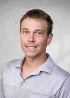 Ethan Tallakson headshot