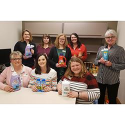 Haverty Hall employees with items they donated